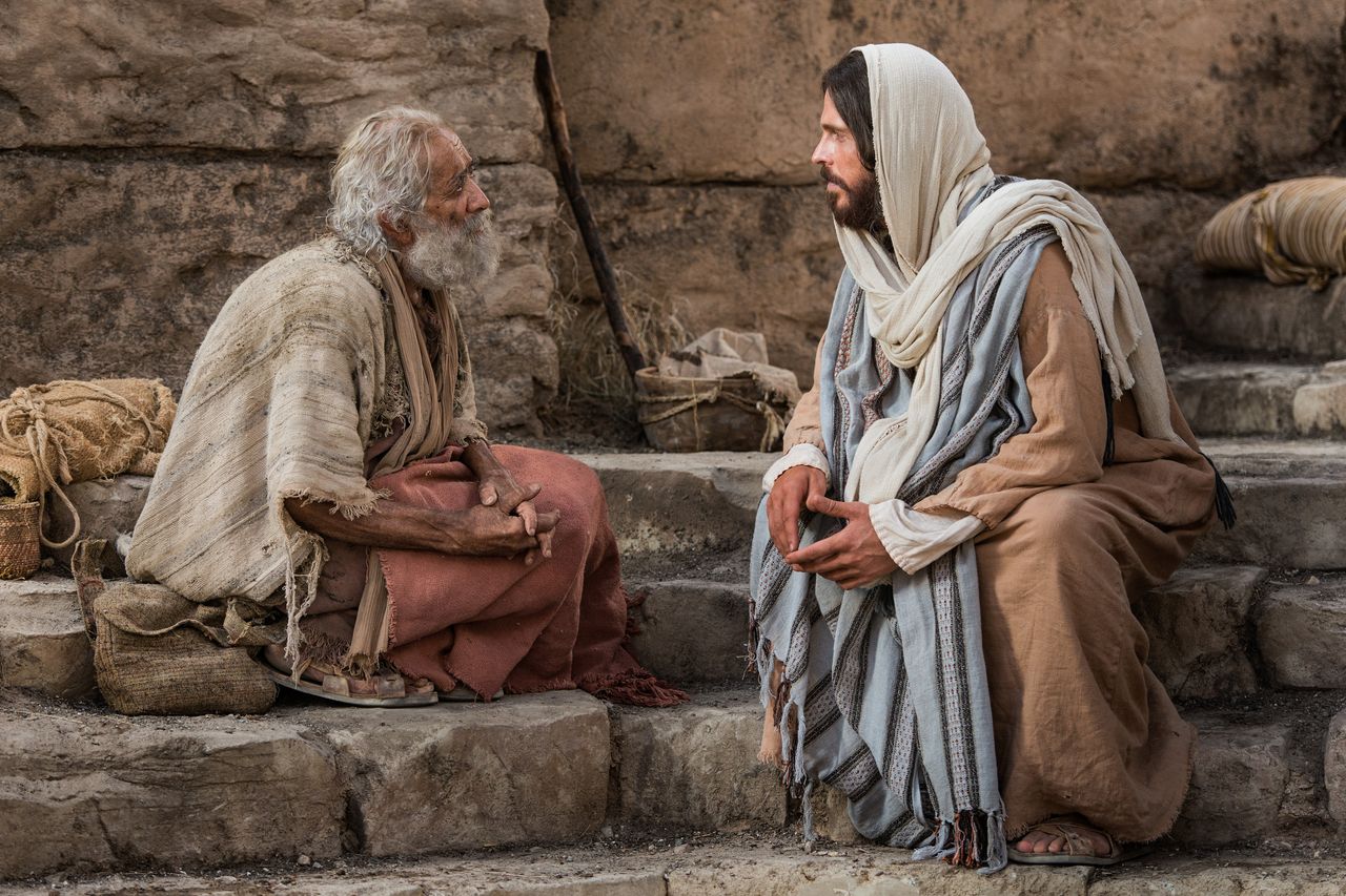 Jesus Christus spricht am Teich von Betesda mit einem Mann und heilt ihn